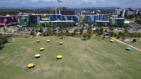 village heart park and smith collective apartment buildings in southport, queensland, australia. aerial shot
