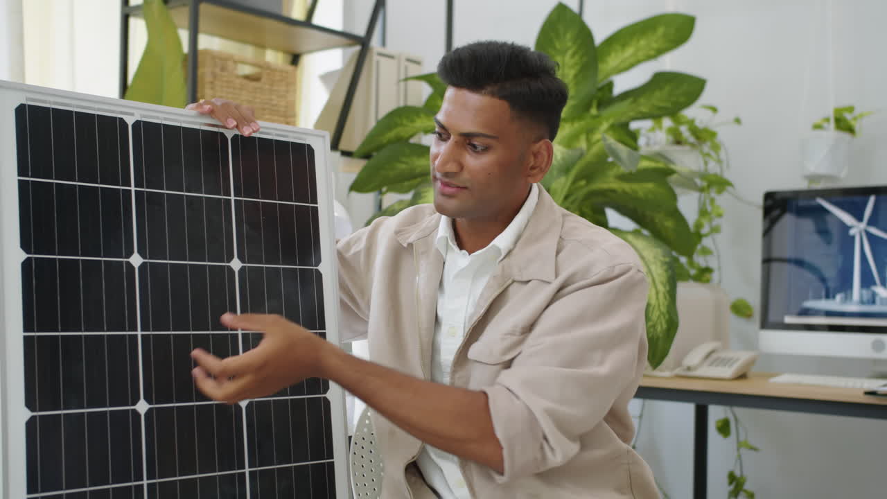 Indian Engineer Talking about Innovations in Solar panel Development