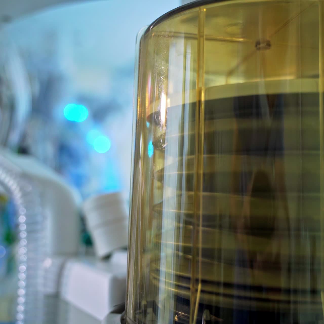 Work of medical apparatus. Anaesthesia machine ventilator of patient's monitor inside the operating room. Close-up on blurred background in clinic.
