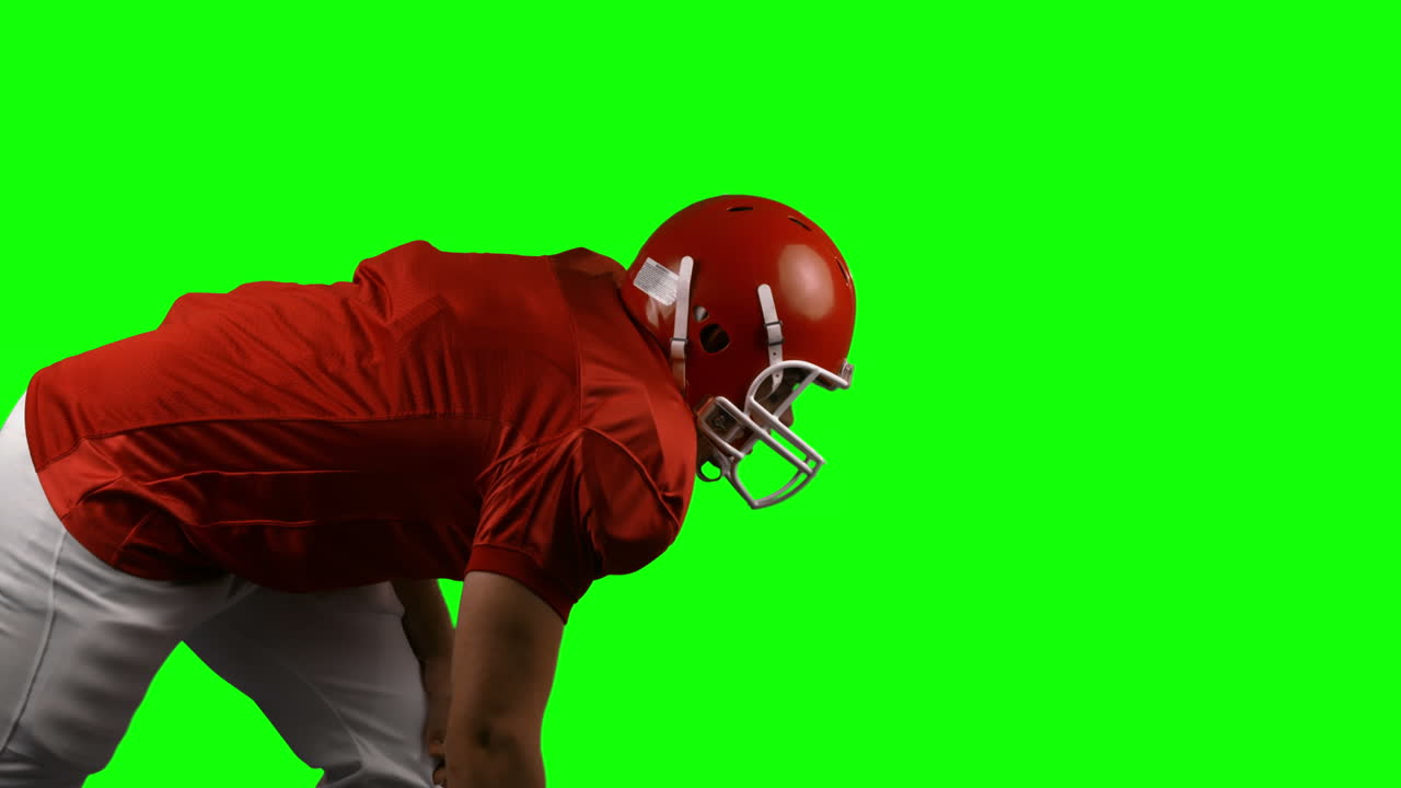 Giocatore di football americano su green screen
