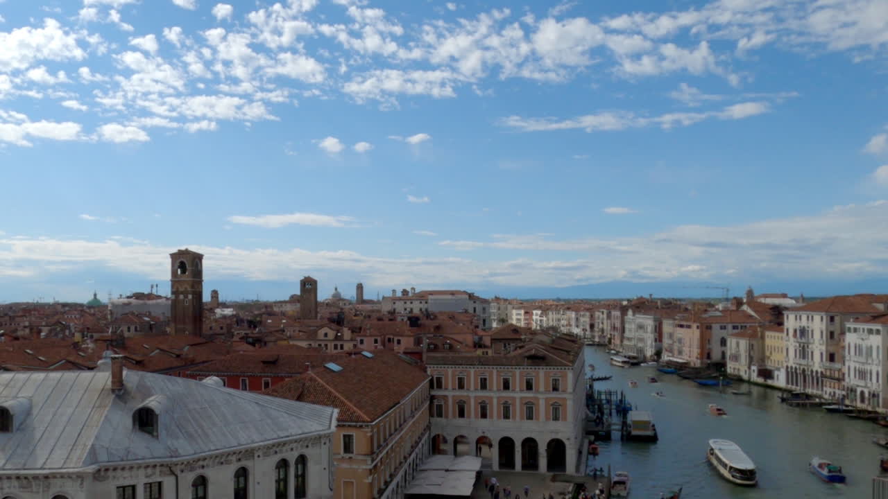Aerial view of Venice, Italy with many ships and gondolas navigating the canals