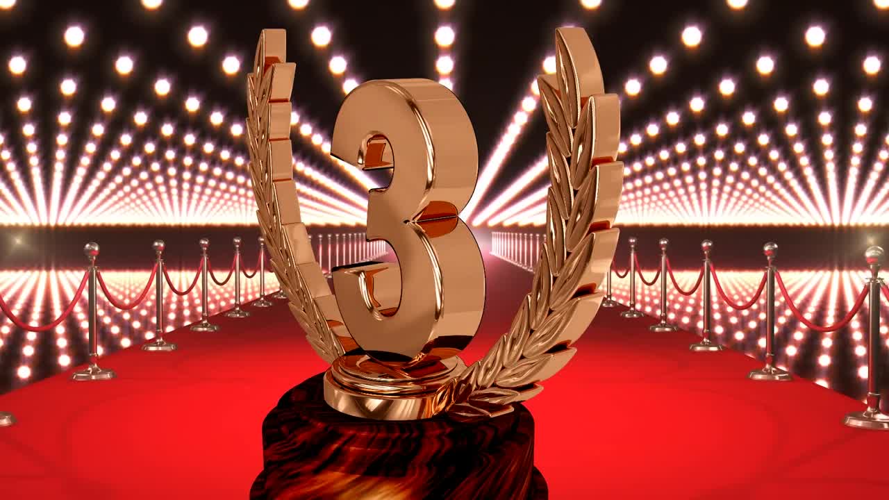 Animation of third place award trophy at floodlit, red carpet winners' prize giving ceremony