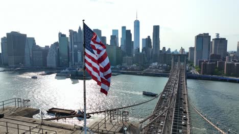 American-flag-waving-on-bright,-sunny-day-in-New-York-City