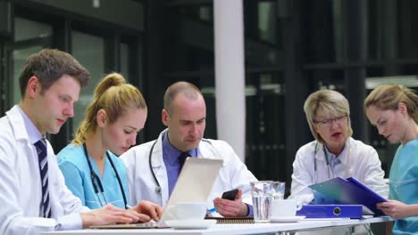 team of doctors working in conference room