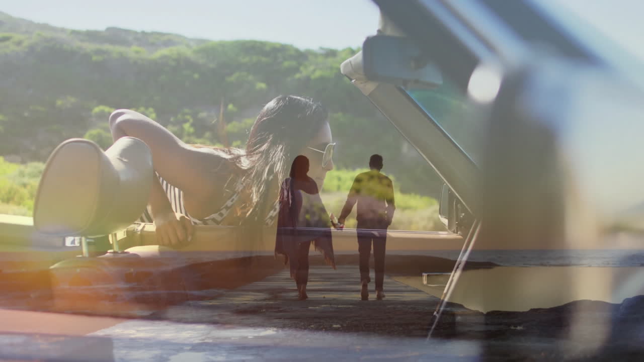 Holding hands on beach, couple with animation of woman in convertible car