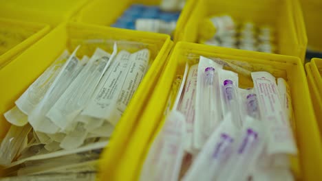 baskets full of medical needles in a third world nation rural clinic