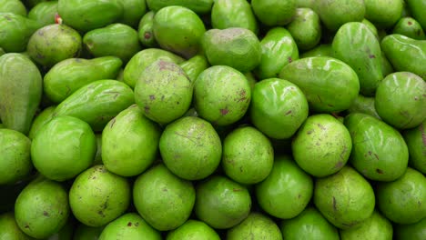 fresh native avocados from colombia. wide shot