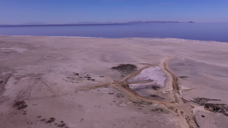 4k drone flight over arid landscape in utah at great salt lake