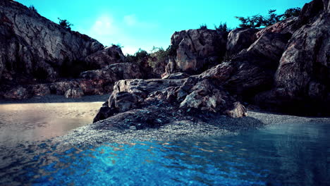 Tropische-Felseninsel-Gegen-Blauen-Himmel-Und-Meer