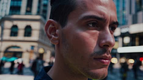 close up of a delivery worker's thoughtful expression amidst the bustling urban backdrop of new york city, capturing a moment of stillness in his busy workday