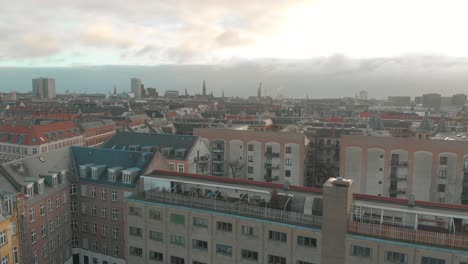 drone shot flying over copenhagen in the morning