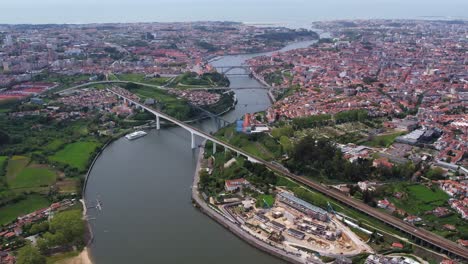 aerial view of porto, portugal, showing bridges over the douro river and the surrounding cityscape