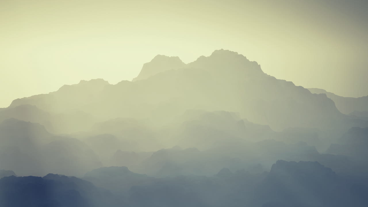 Mountain landscape with mist during early morning hours in natures tranquility