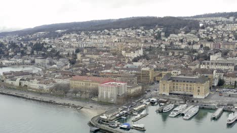 The-romantic-village-Neuchâtel-located-on-the-beautiful-lake-during-the-winter-season-in-the-swiss-alpine-landscape,-Switzerland,-Europe