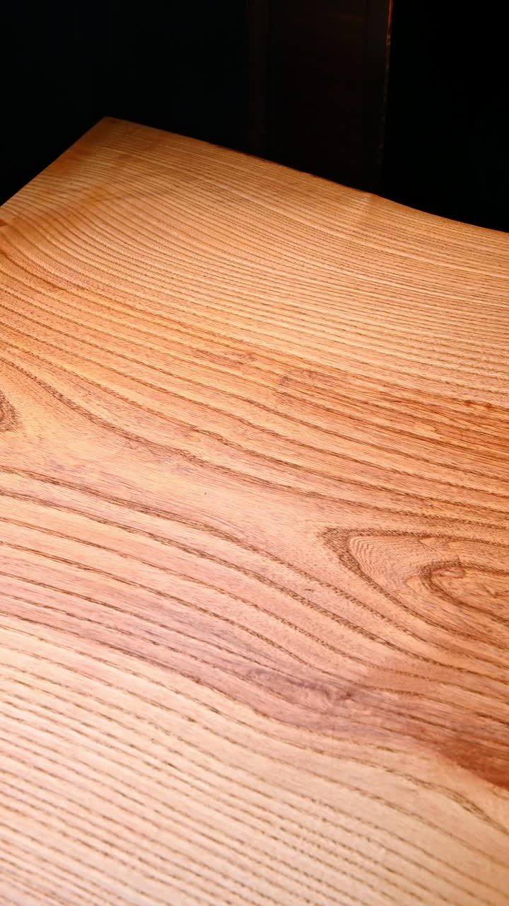 Waiter serving colorful brunch plates. Hand places dessert beside eggs, salad and snacks creating a rich weekend brunch scene