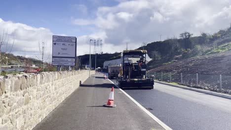 Bilberry-Road-Waterford-Ireland,-new-tarmac-being-laid-on-a-major-project-finishing-the-Waterford-Greenway-between-Waterford-and-Dungarvan