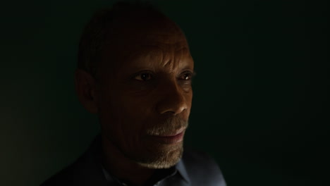 close-up sad black male eyes