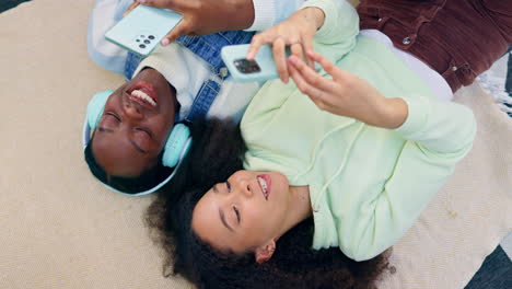 women, together and phone on floor