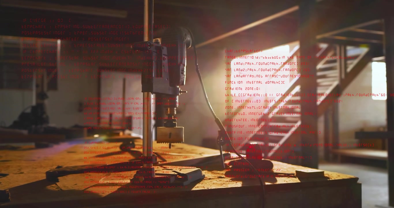 Red code intensifying, drill press descending drill bit rotating, touching wood block for alignment