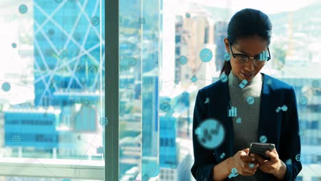 animation of media icons over happy biracial woman using smartphone