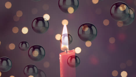 animation of lit candle with flickering spots of light