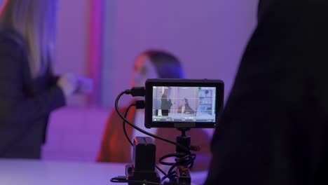 filming an interview in a studio