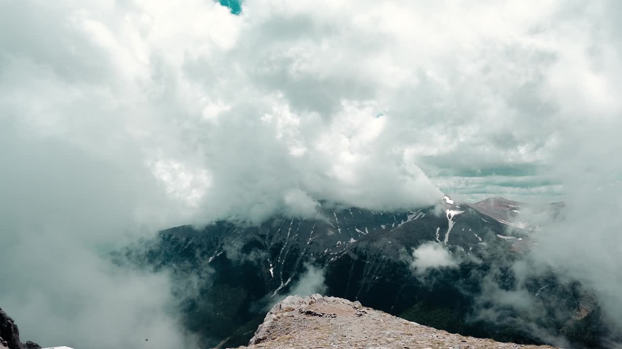Epic cloud formation and airflow in Mount Olympus peak, inside the clouds, Greece
