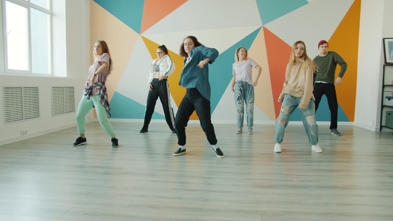 Teenagers Dancing in a Dance Studio