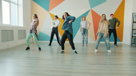 teenagers dancing in a dance studio