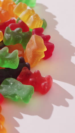 video of colourful jelly candy on white background