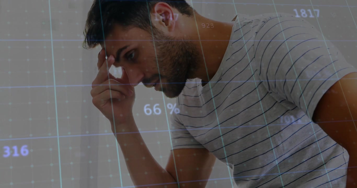 Homem inclinado para a frente num banco, processando dados numéricos em tecnologia com atualização de grade transparente