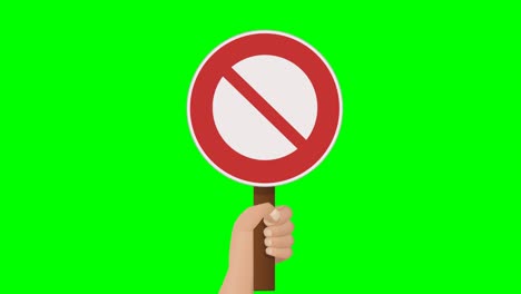 a hand holds up a prohibition sign on green background