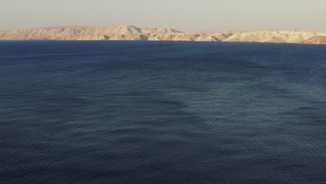 Idyllic-dark-blue-sea-and-visible-light-breeze-on-the-surface