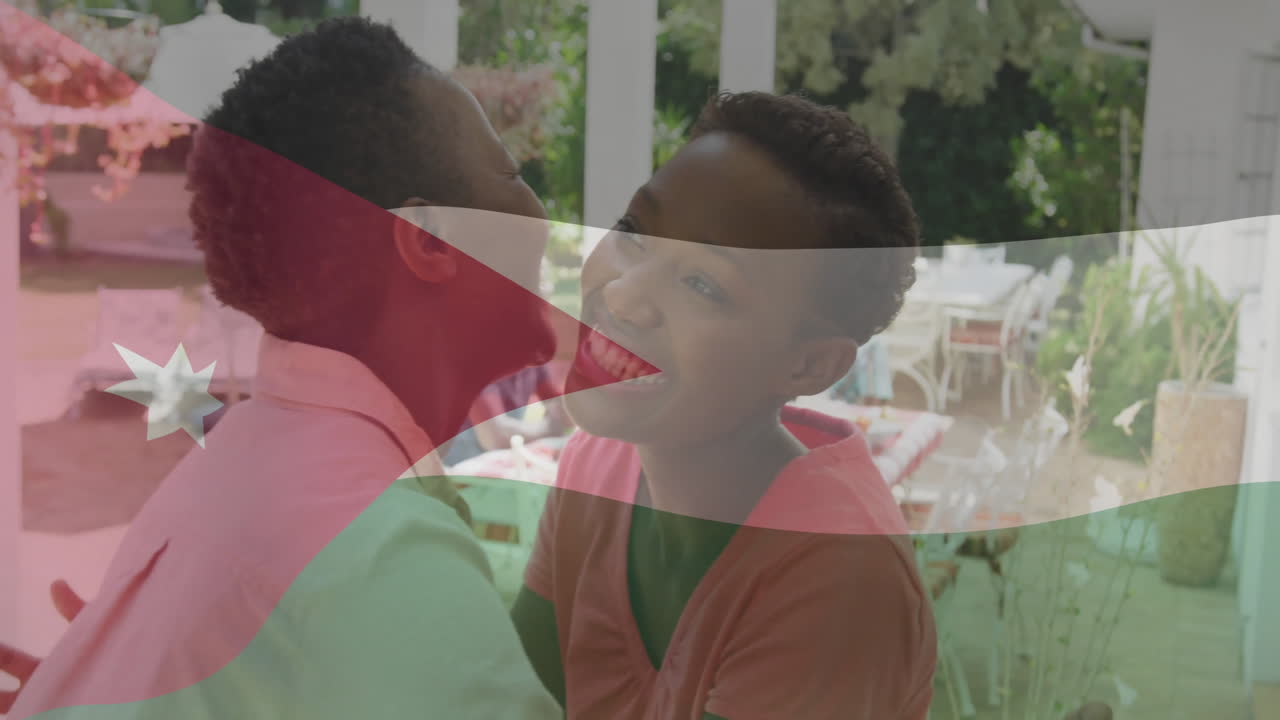 Embracing with Burundi flag overlay, two people smiling together happily