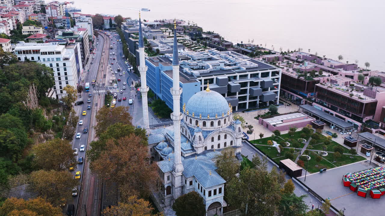 Overlooking Dolmabahçe Mosque and the Bosphorus, blending historic Ottoman design with Istanbul’s modern waterfront skyline