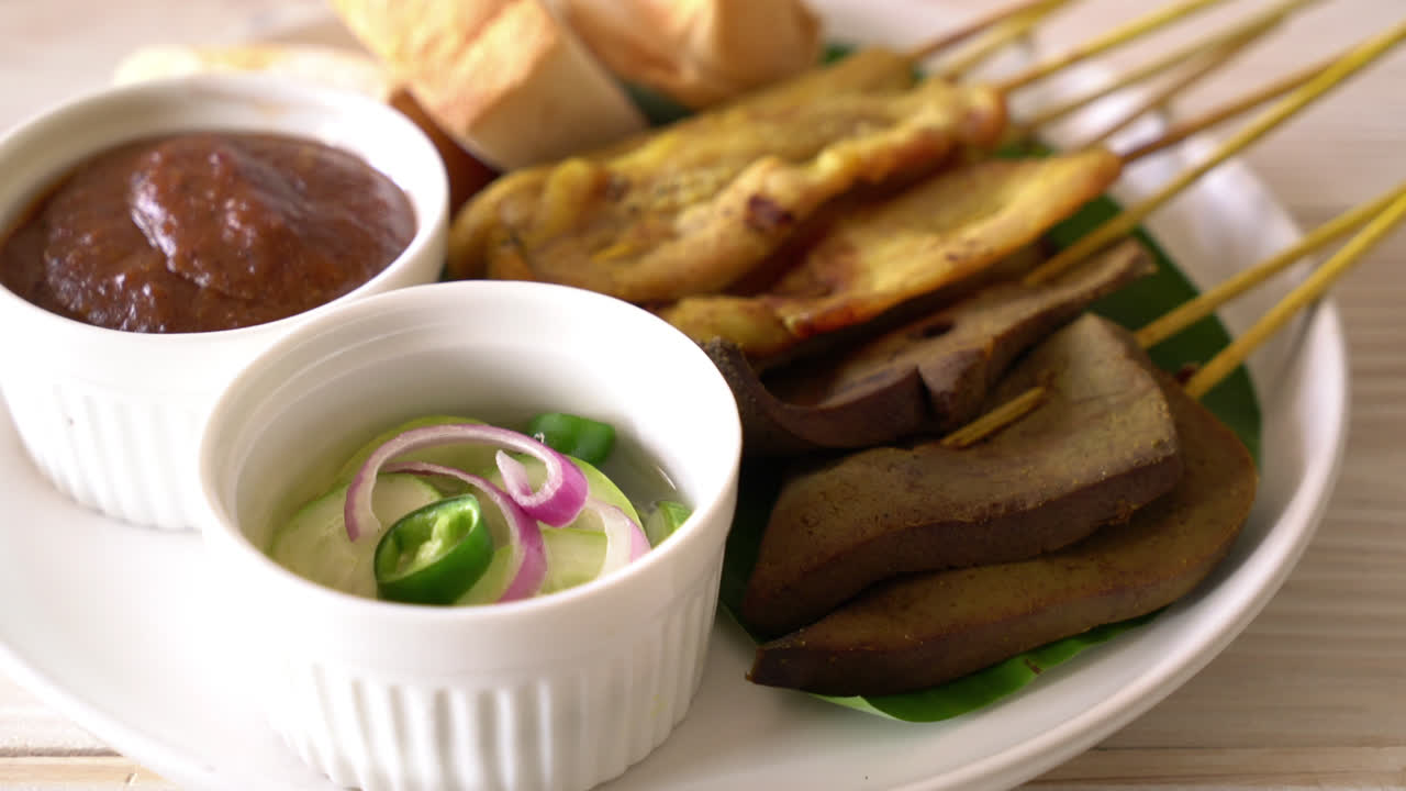Pork Satay and Liver Satay with Bread and Peanut Sauce