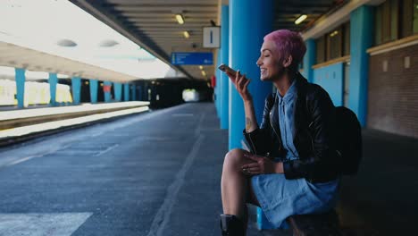 Pink-hair-woman-talking-on-mobile-phone-4k