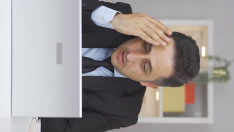 Vertical video of Home office worker man&#039;s hands are shaking.