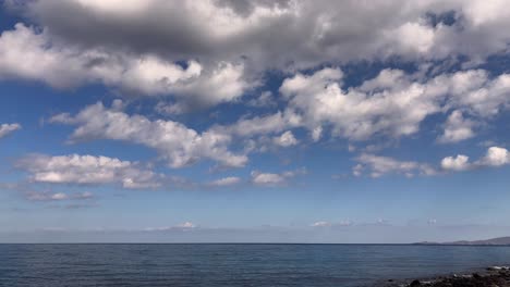 expansive sea view with a cloudy sky and distant horizon at crete greece beach