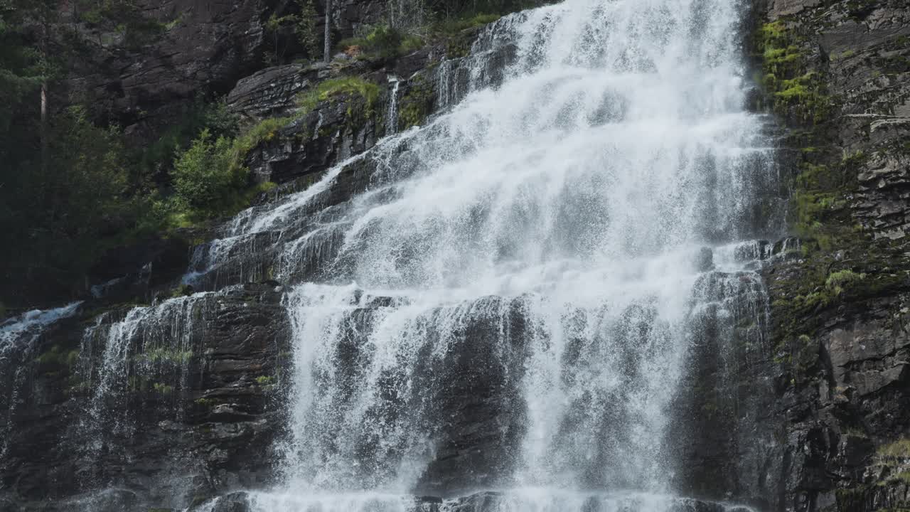 A powerful torrent of whitewater cascades from the mountain