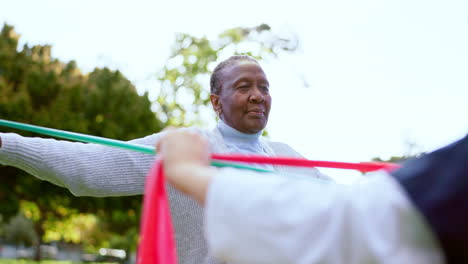 Elderly,-woman-and-nurse-with-stretching-band