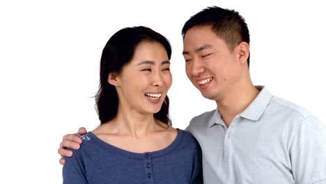 portrait of asian smiling couple posing