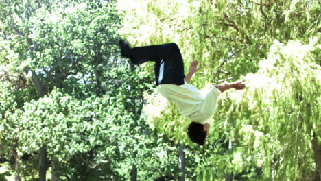 man performing a backflip in slow motion