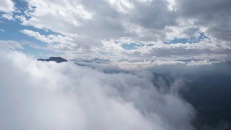 flying through cloudy mountains aerial drone shot thermessos, antalya, turkey