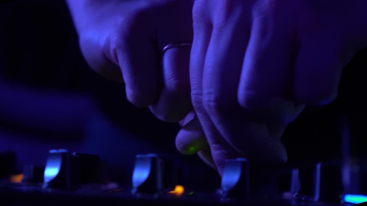 DJ Mixing Music in the Dark