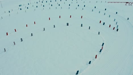 skiing chalet biathlon  training drone aerial tilt reveal