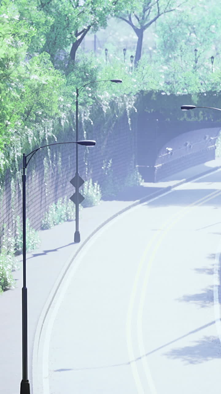 Greenery surrounds a calm road under an arching bridge