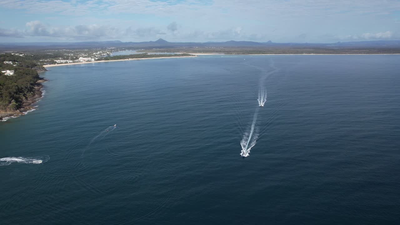Jet Skis In Blue Ocean Water, Sunshine Coast, Queensland, Australia - Aerial Drone Shot