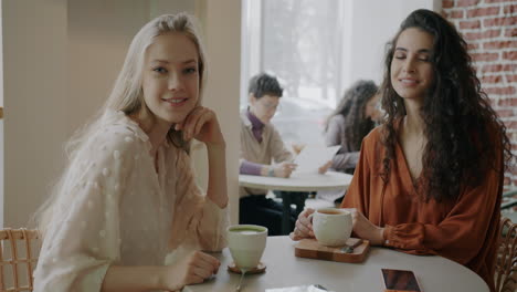 friends enjoying coffee at a cafe