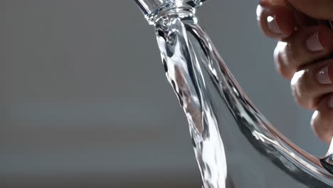 pouring water from a bottle